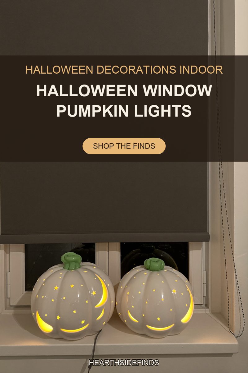 Two white ceramic pumpkins with green stems and star and moon cutouts glowing on a white windowsill.