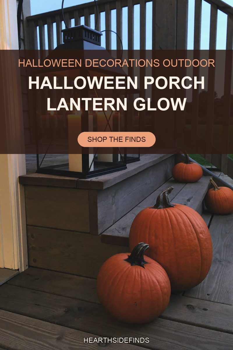 Black metal lantern of glowing cream pillar candles on a wood porch step at dusk with four orange pumpkins.