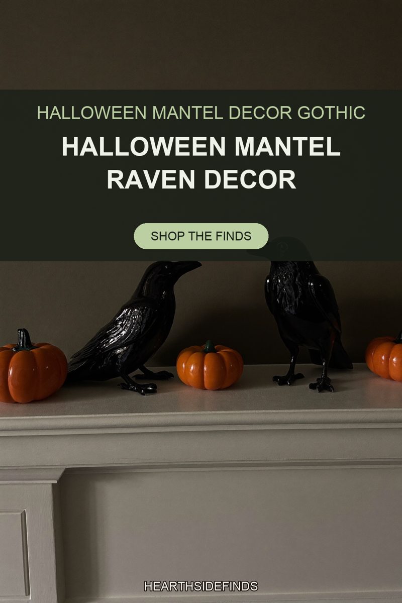 Two glossy black raven figurines on a pale mantel with three small orange ceramic pumpkins, olive wall.